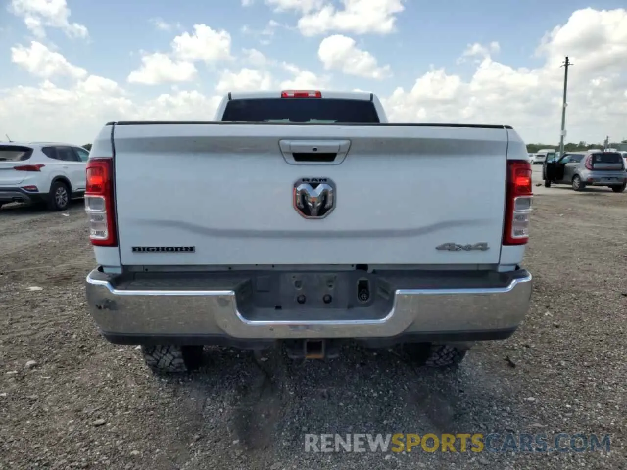 6 Photograph of a damaged car 3C6UR5JL3NG247441 RAM 2500 2022