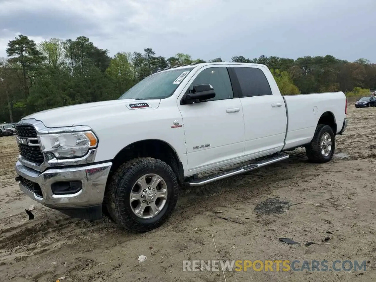 1 Photograph of a damaged car 3C6UR5JL4NG156579 RAM 2500 2022