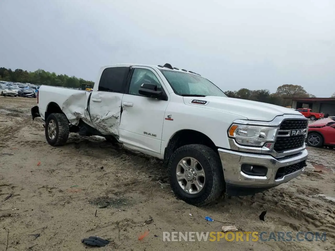 4 Photograph of a damaged car 3C6UR5JL4NG156579 RAM 2500 2022