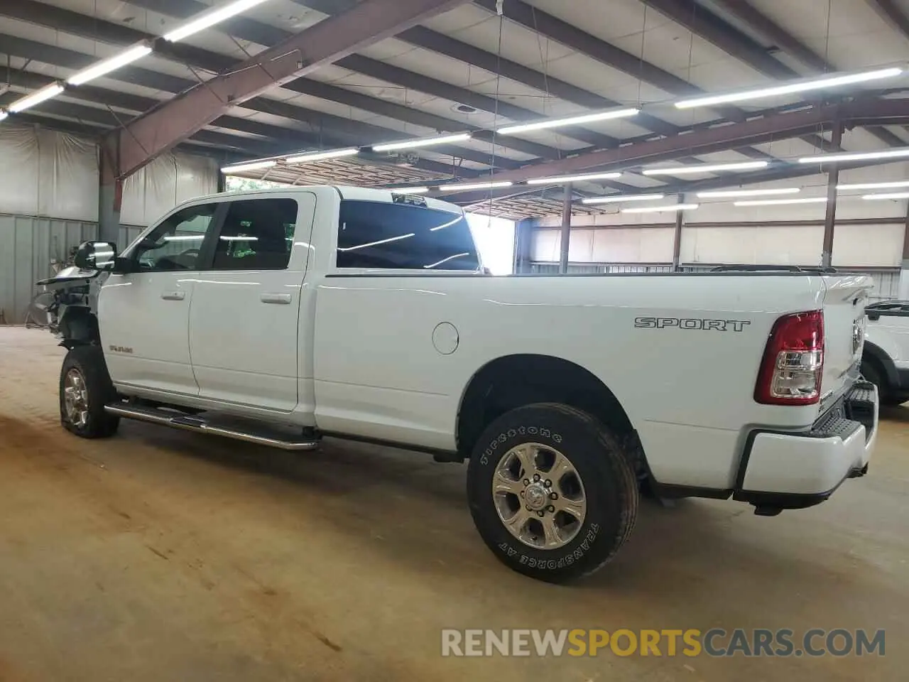 2 Photograph of a damaged car 3C6UR5JL4NG343756 RAM 2500 2022