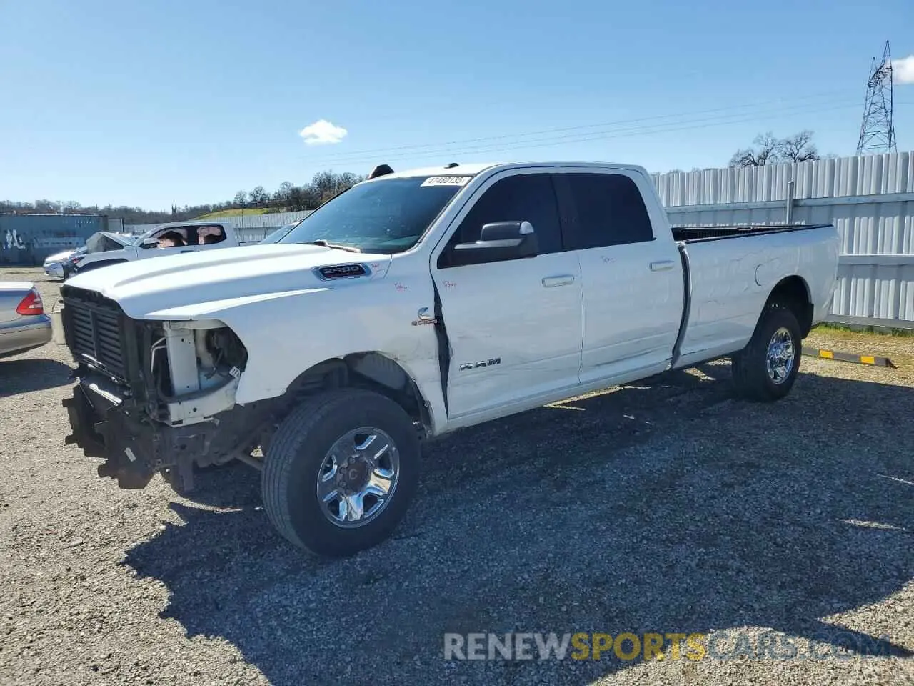 1 Photograph of a damaged car 3C6UR5JL8NG297154 RAM 2500 2022