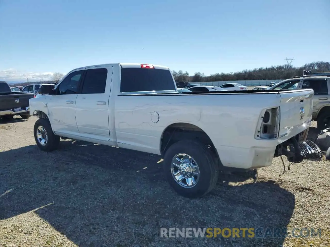 2 Photograph of a damaged car 3C6UR5JL8NG297154 RAM 2500 2022