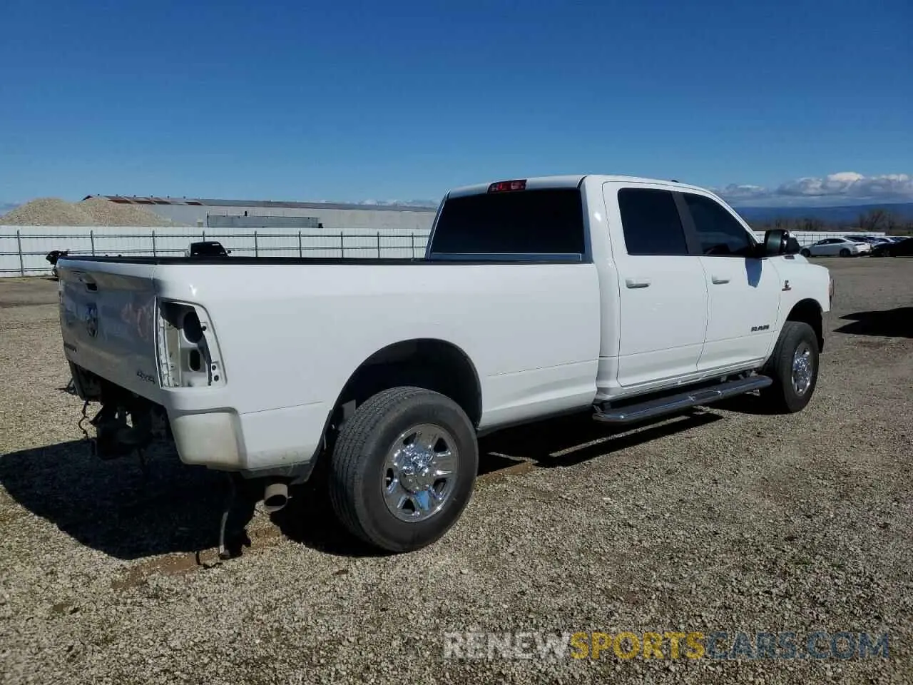 3 Photograph of a damaged car 3C6UR5JL8NG297154 RAM 2500 2022