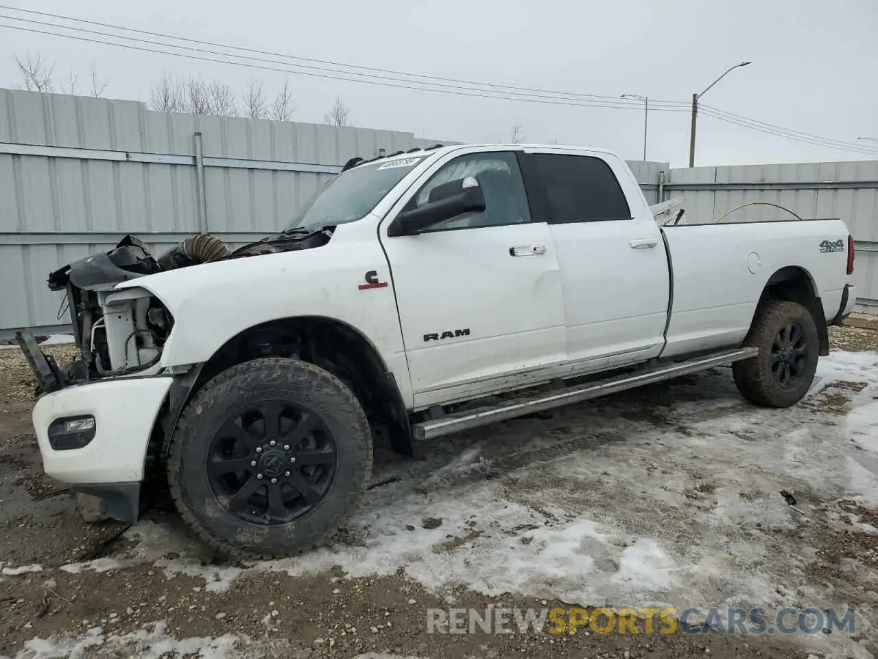 1 Photograph of a damaged car 3C6UR5JL9NG383024 RAM 2500 2022