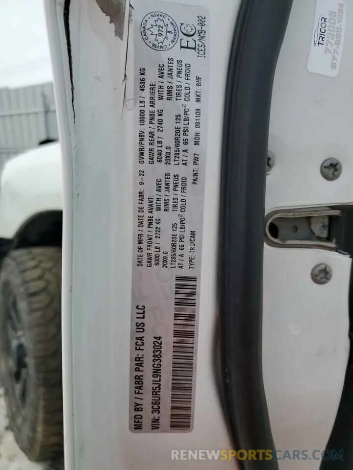 13 Photograph of a damaged car 3C6UR5JL9NG383024 RAM 2500 2022