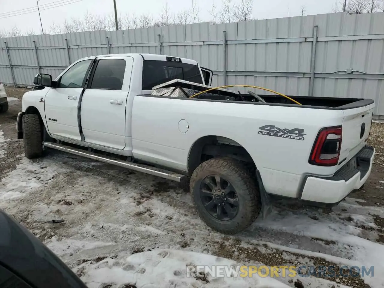 2 Photograph of a damaged car 3C6UR5JL9NG383024 RAM 2500 2022