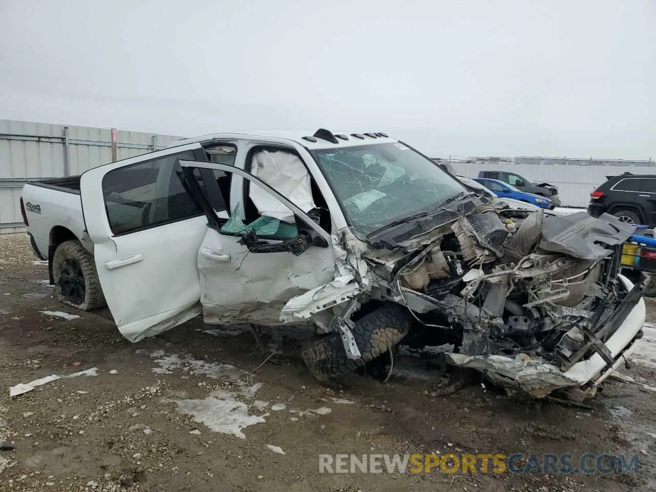 4 Photograph of a damaged car 3C6UR5JL9NG383024 RAM 2500 2022
