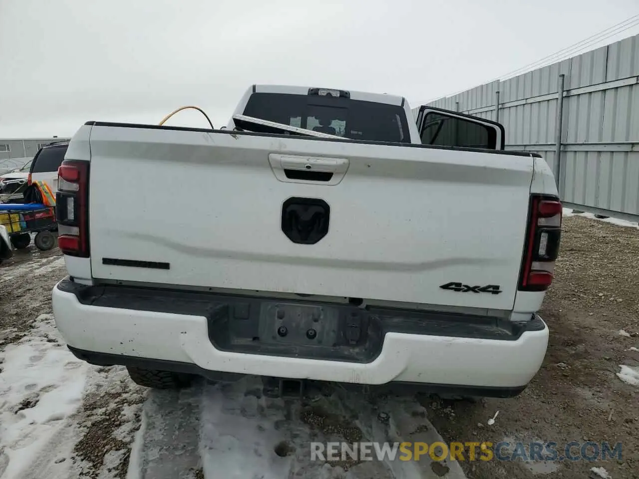 6 Photograph of a damaged car 3C6UR5JL9NG383024 RAM 2500 2022