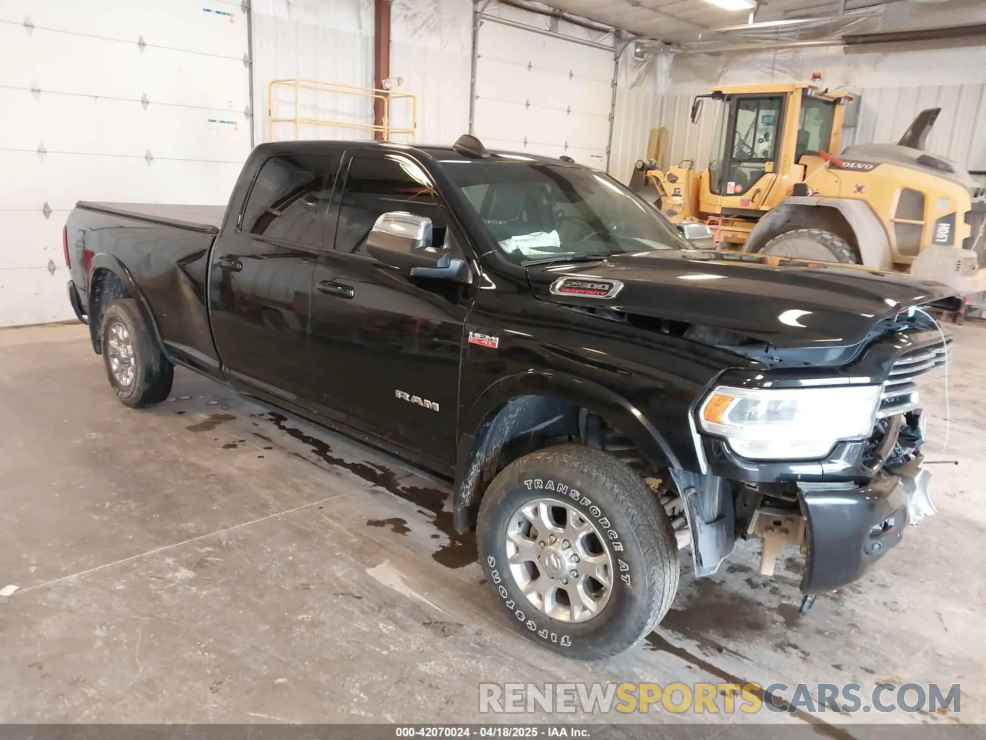 1 Photograph of a damaged car 3C6UR5KJXNG191933 RAM 2500 2022