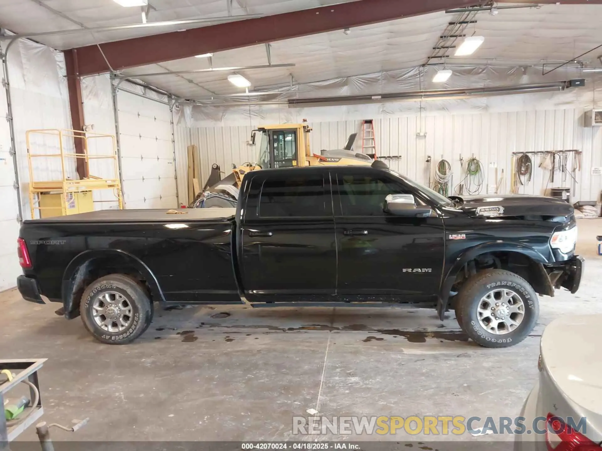 13 Photograph of a damaged car 3C6UR5KJXNG191933 RAM 2500 2022