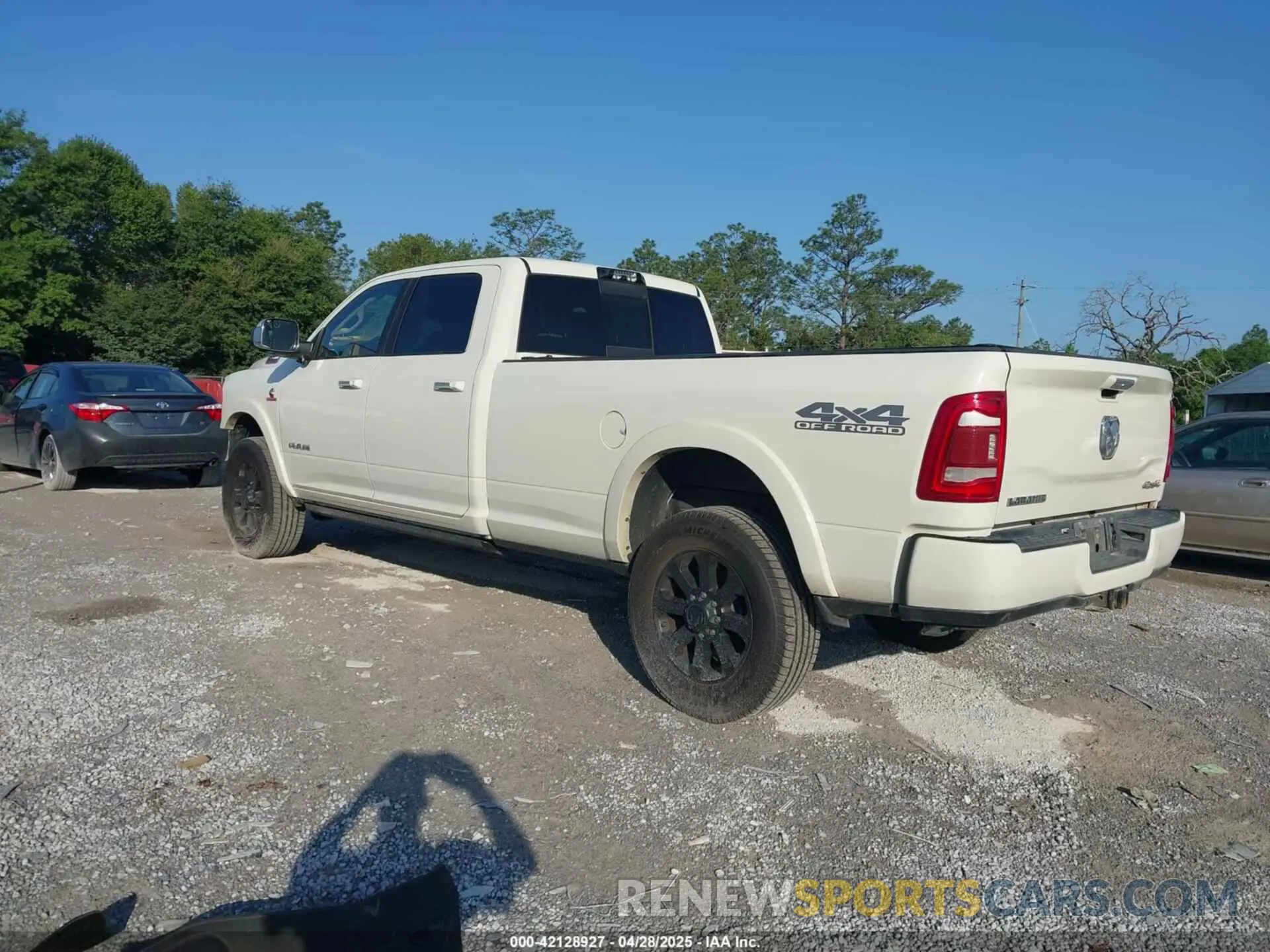 3 Photograph of a damaged car 3C6UR5KL0NG408021 RAM 2500 2022