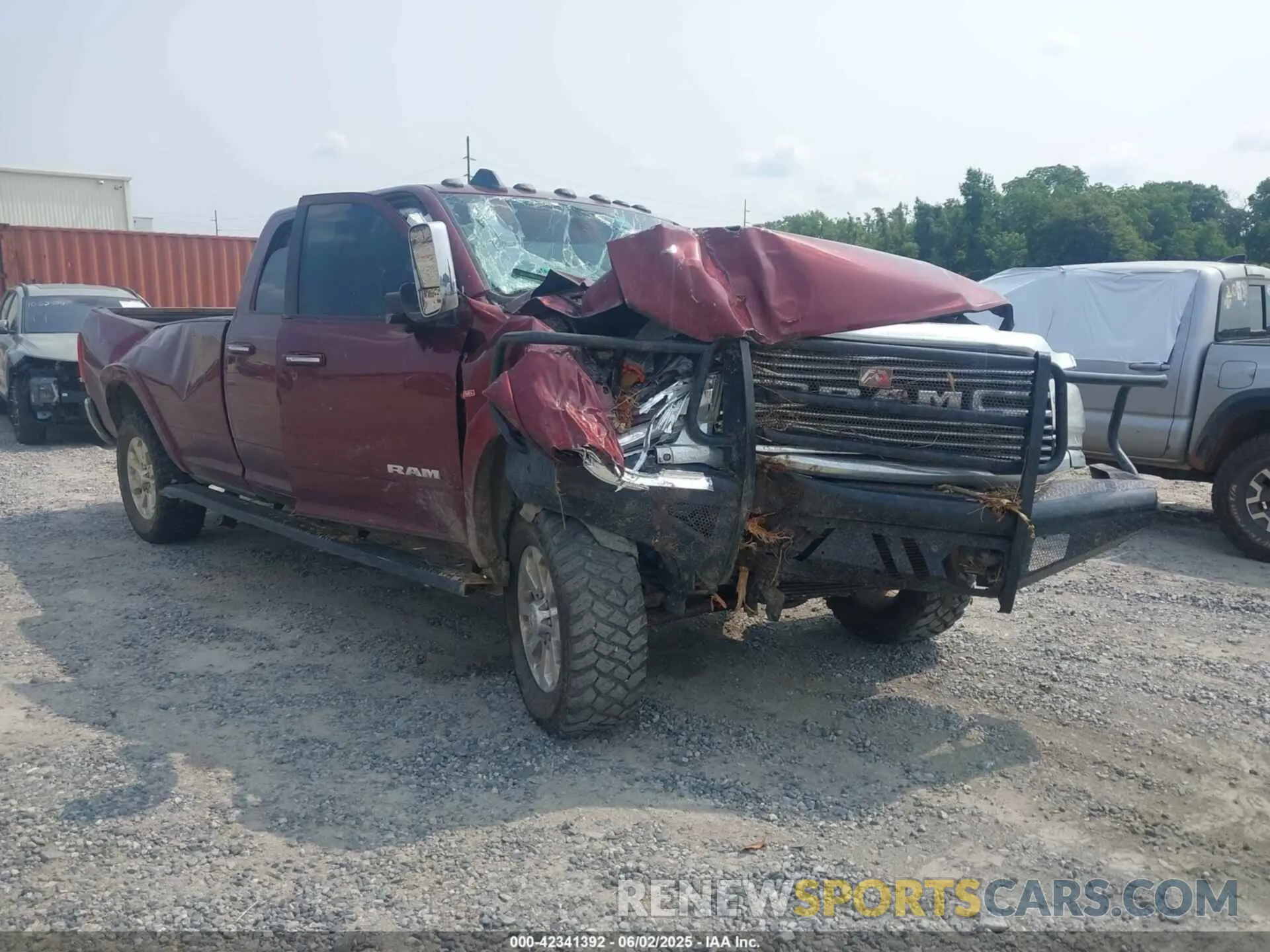 1 Photograph of a damaged car 3C6UR5KL1NG358794 RAM 2500 2022
