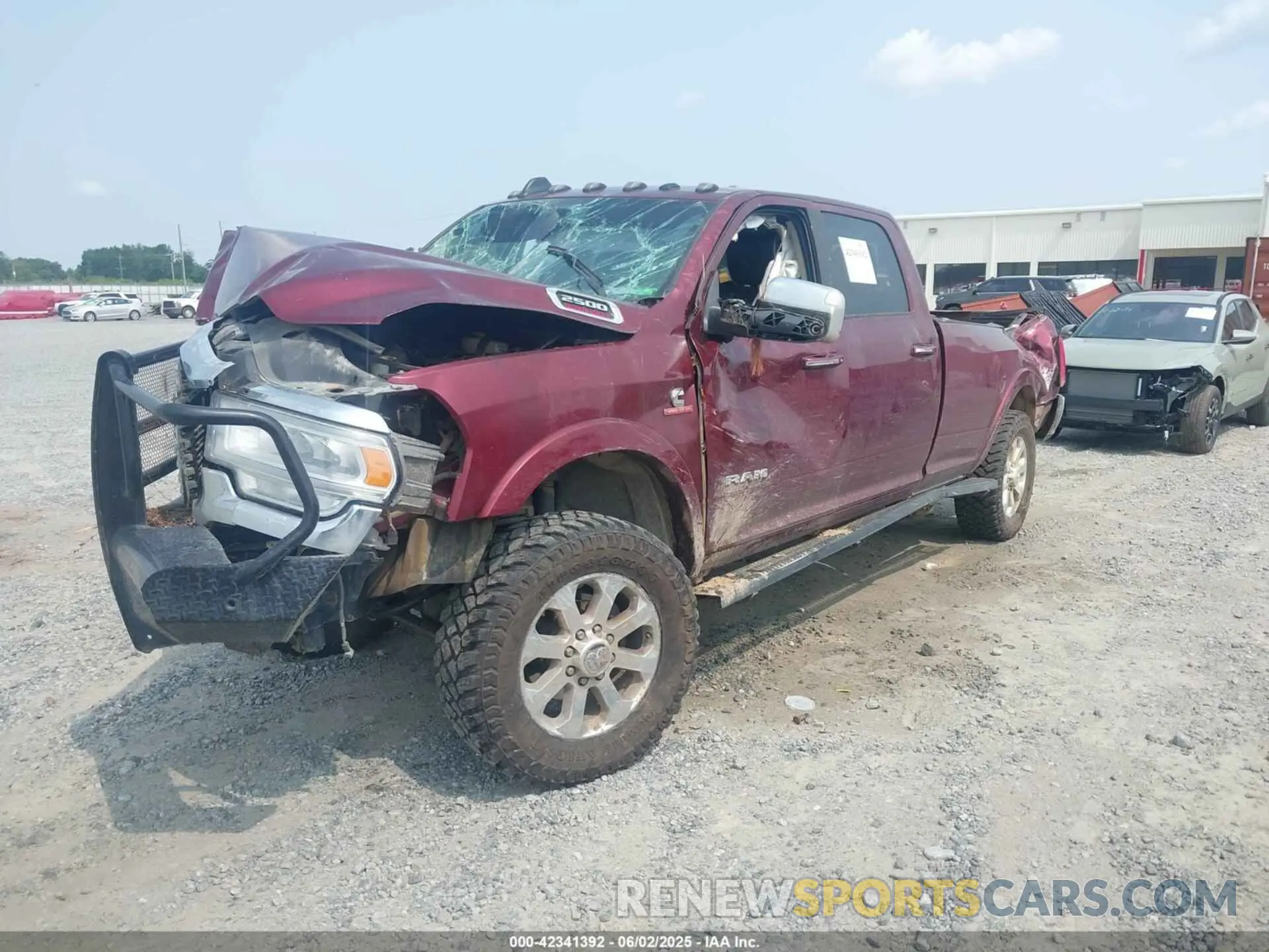 2 Photograph of a damaged car 3C6UR5KL1NG358794 RAM 2500 2022