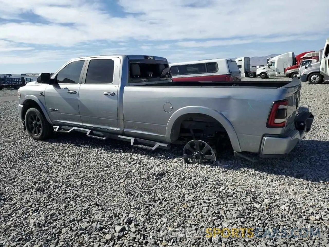 2 Photograph of a damaged car 3C6UR5KL5NG306956 RAM 2500 2022