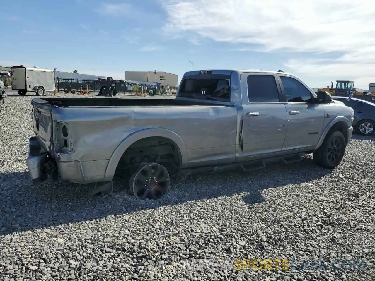 3 Photograph of a damaged car 3C6UR5KL5NG306956 RAM 2500 2022