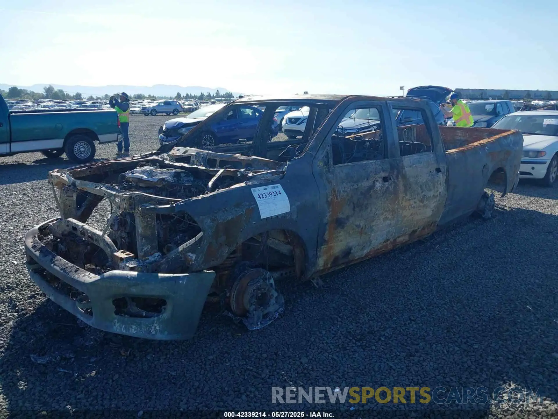 2 Photograph of a damaged car 3C6UR5KL6NG262224 RAM 2500 2022