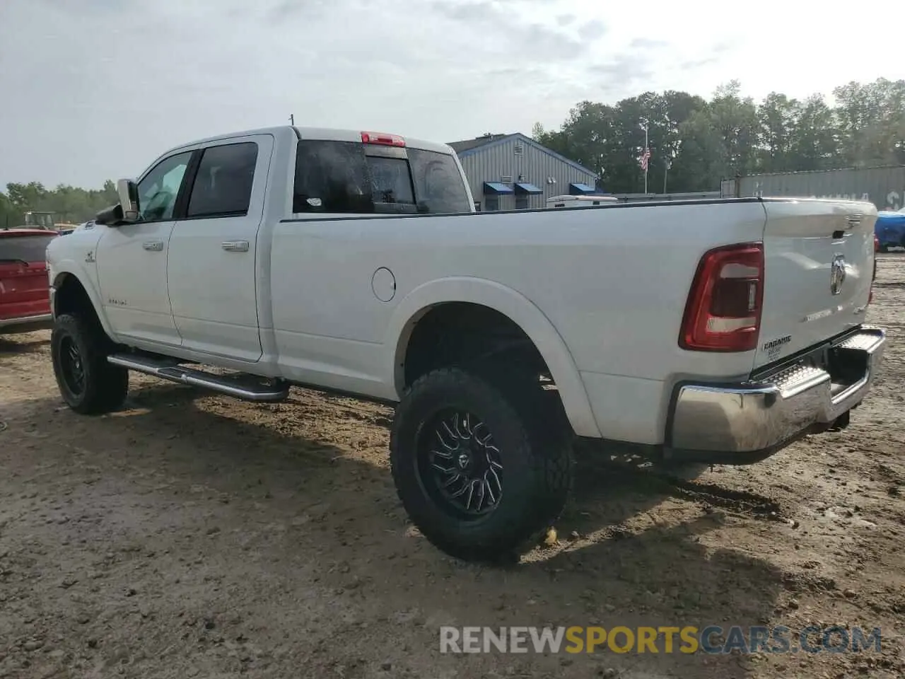 2 Photograph of a damaged car 3C6UR5KL8NG423172 RAM 2500 2022