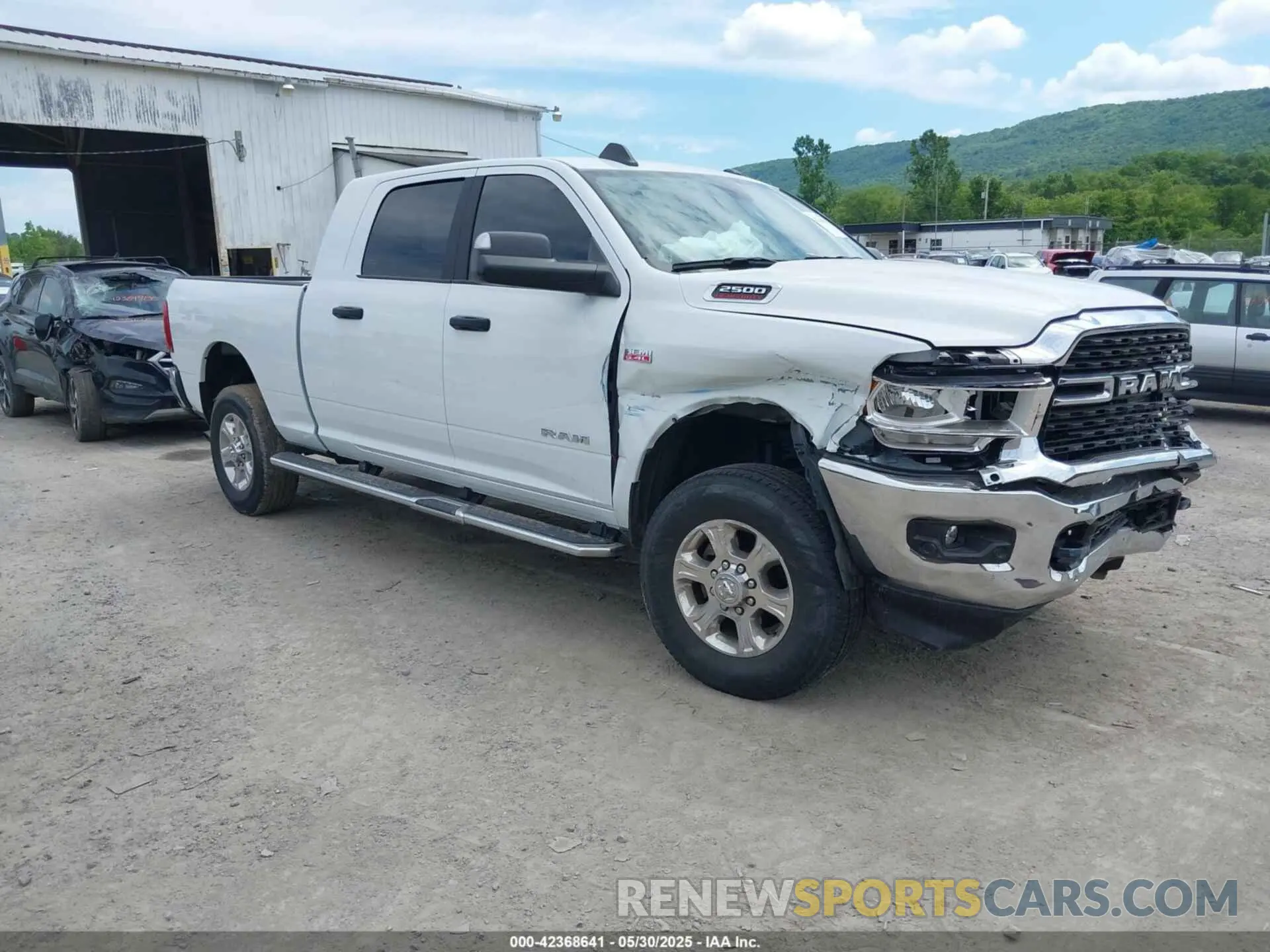 1 Photograph of a damaged car 3C6UR5MJ0NG383441 RAM 2500 2022