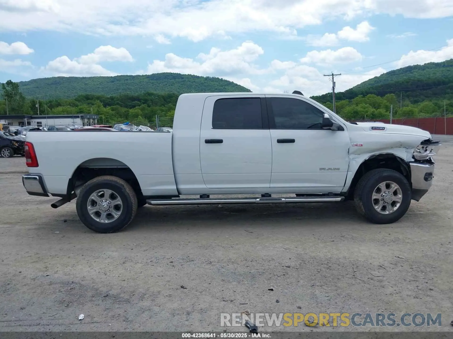 13 Photograph of a damaged car 3C6UR5MJ0NG383441 RAM 2500 2022