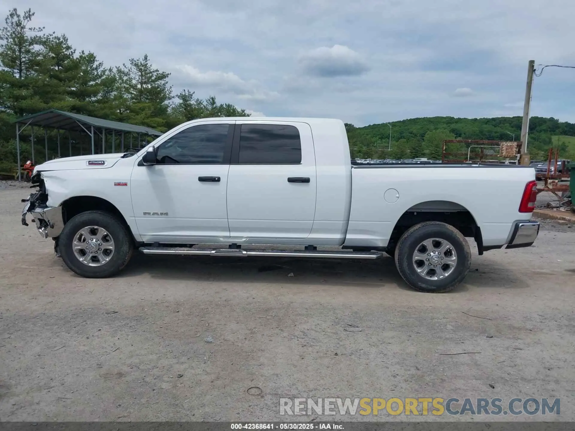 14 Photograph of a damaged car 3C6UR5MJ0NG383441 RAM 2500 2022