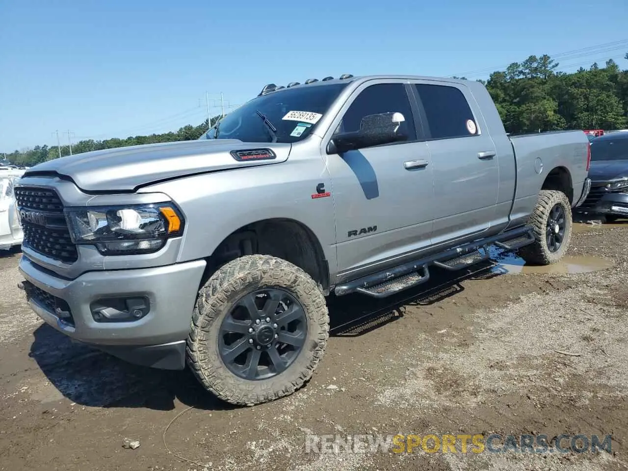 1 Photograph of a damaged car 3C6UR5MLXNG149714 RAM 2500 2022