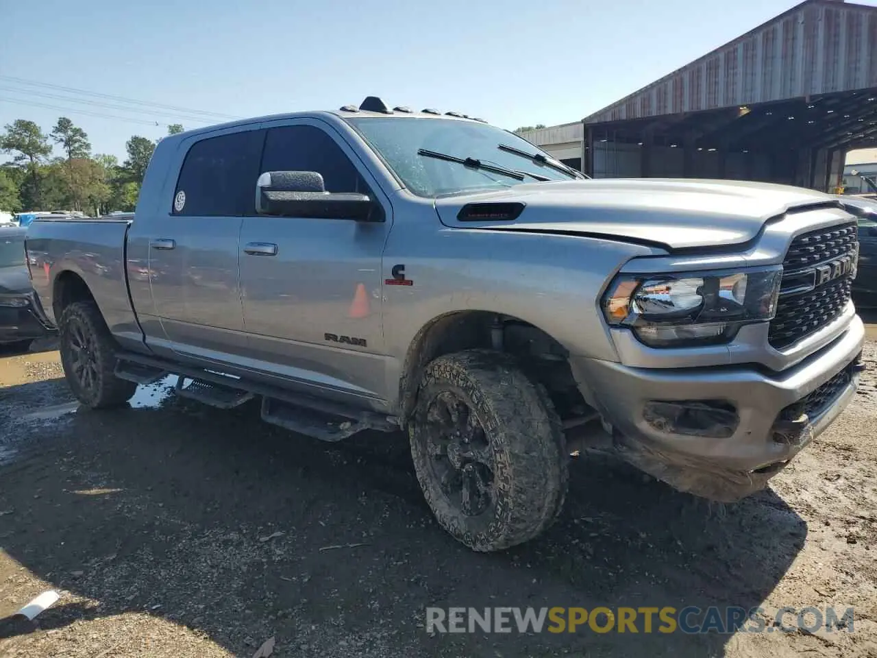 4 Photograph of a damaged car 3C6UR5MLXNG149714 RAM 2500 2022