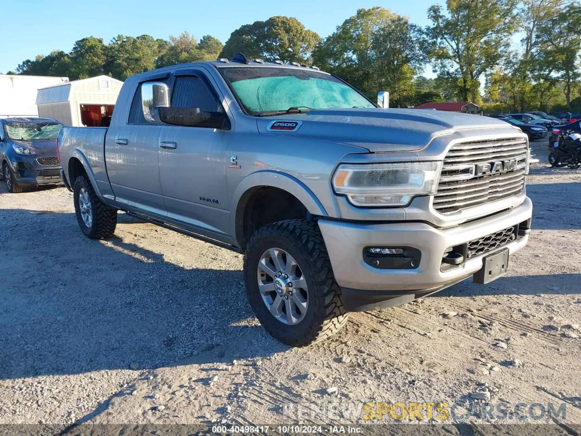 1 Photograph of a damaged car 3C6UR5NL3NG433751 RAM 2500 2022