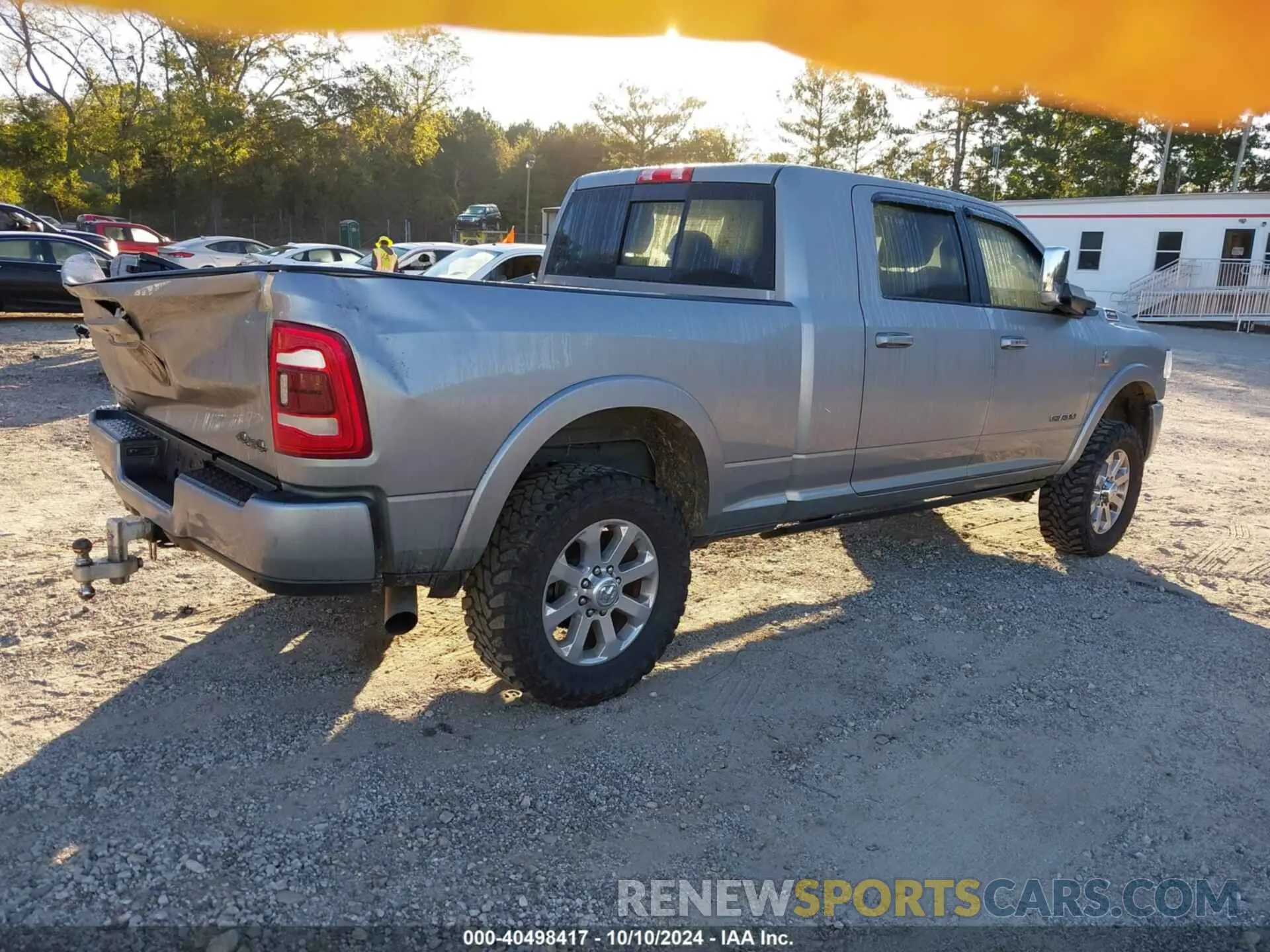 4 Photograph of a damaged car 3C6UR5NL3NG433751 RAM 2500 2022