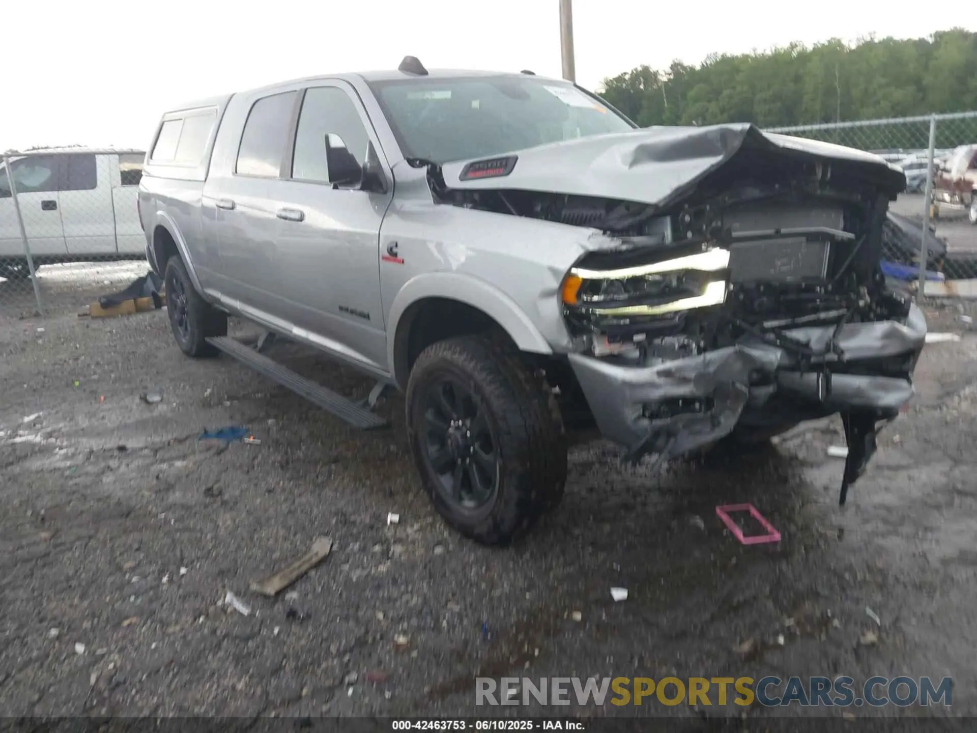 1 Photograph of a damaged car 3C6UR5NL5NG267524 RAM 2500 2022