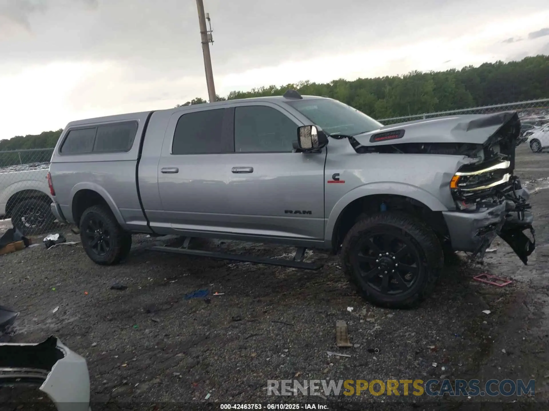 13 Photograph of a damaged car 3C6UR5NL5NG267524 RAM 2500 2022