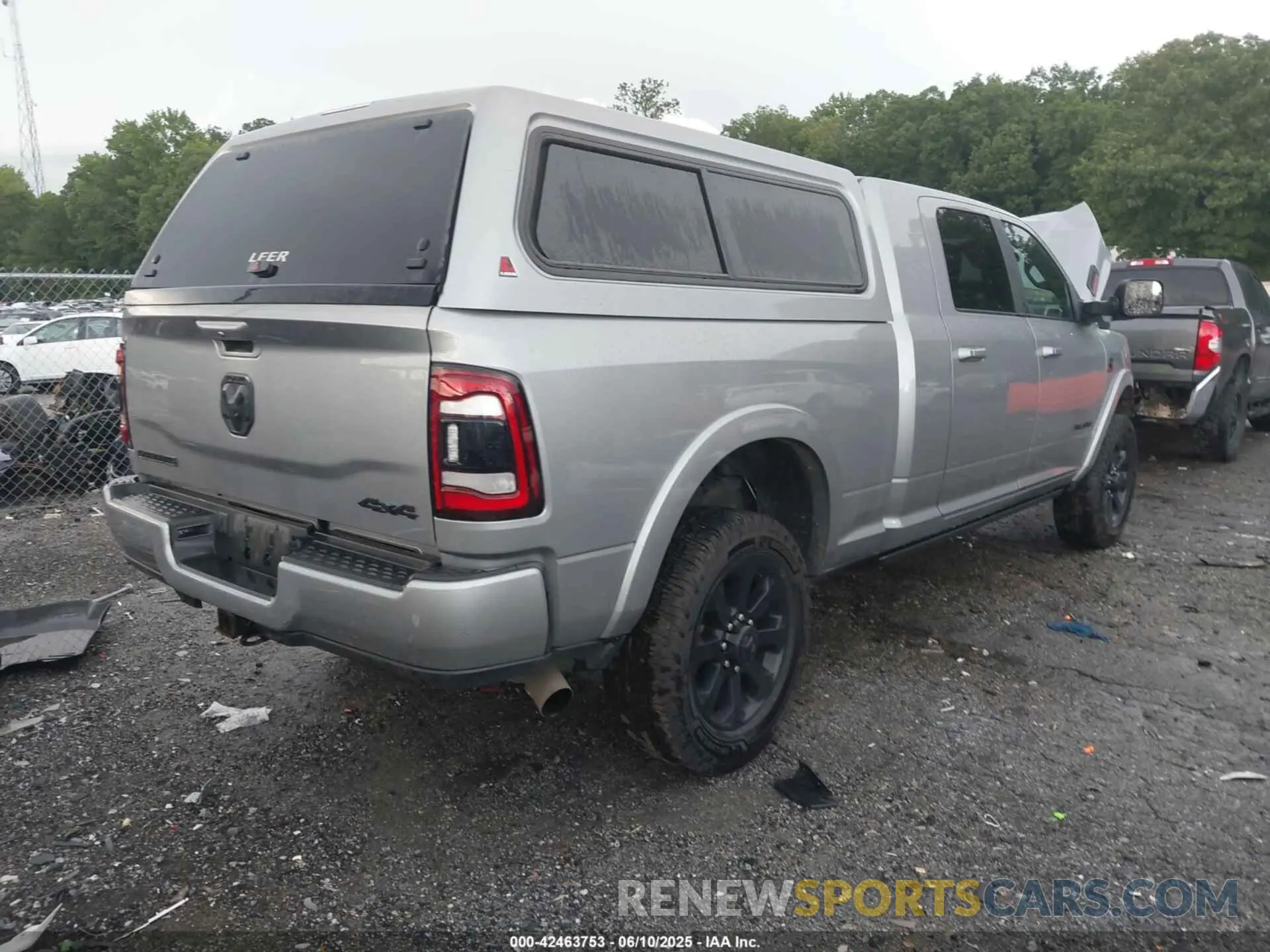 4 Photograph of a damaged car 3C6UR5NL5NG267524 RAM 2500 2022