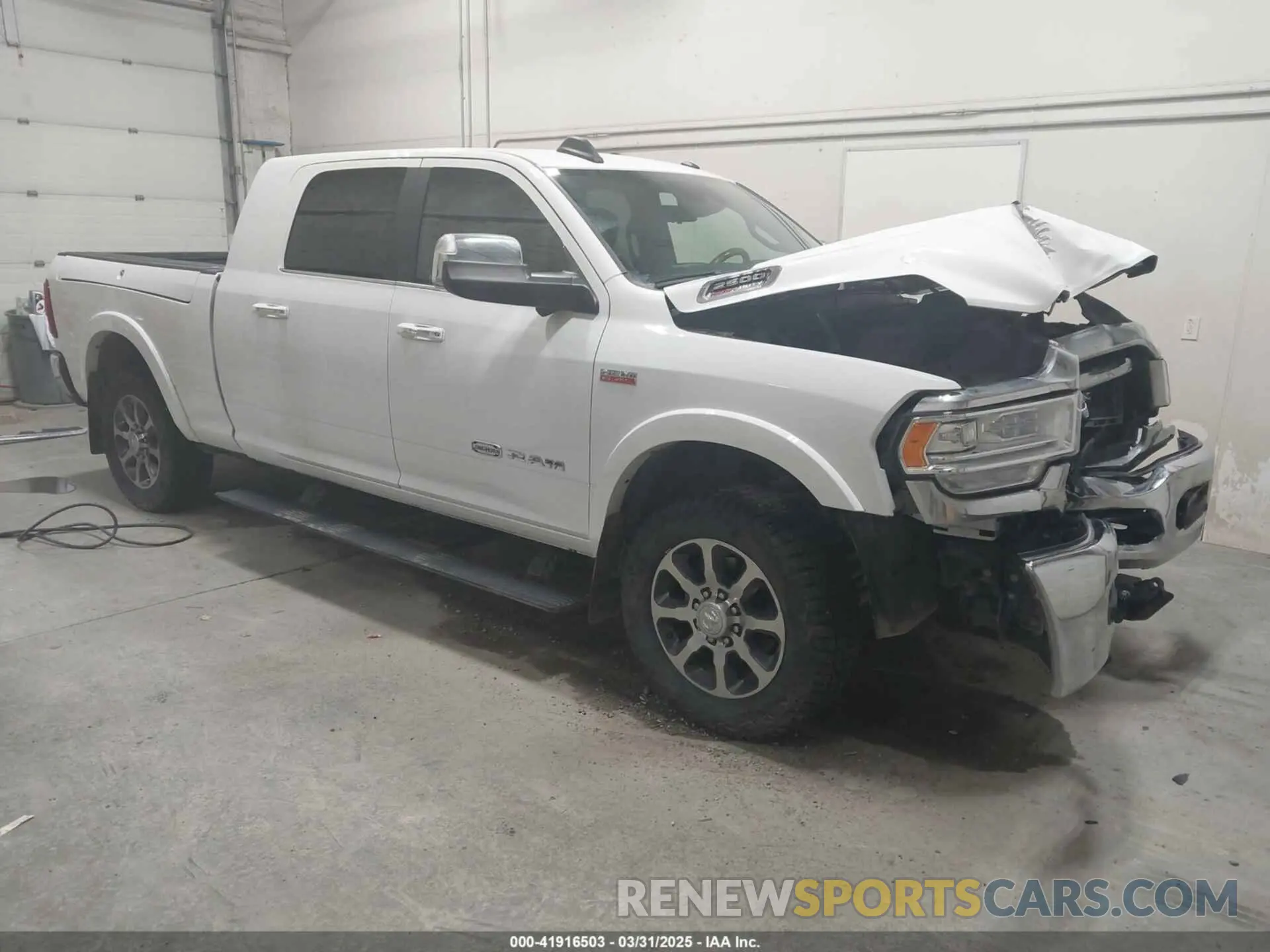 1 Photograph of a damaged car 3C6UR5PJ2NG183642 RAM 2500 2022