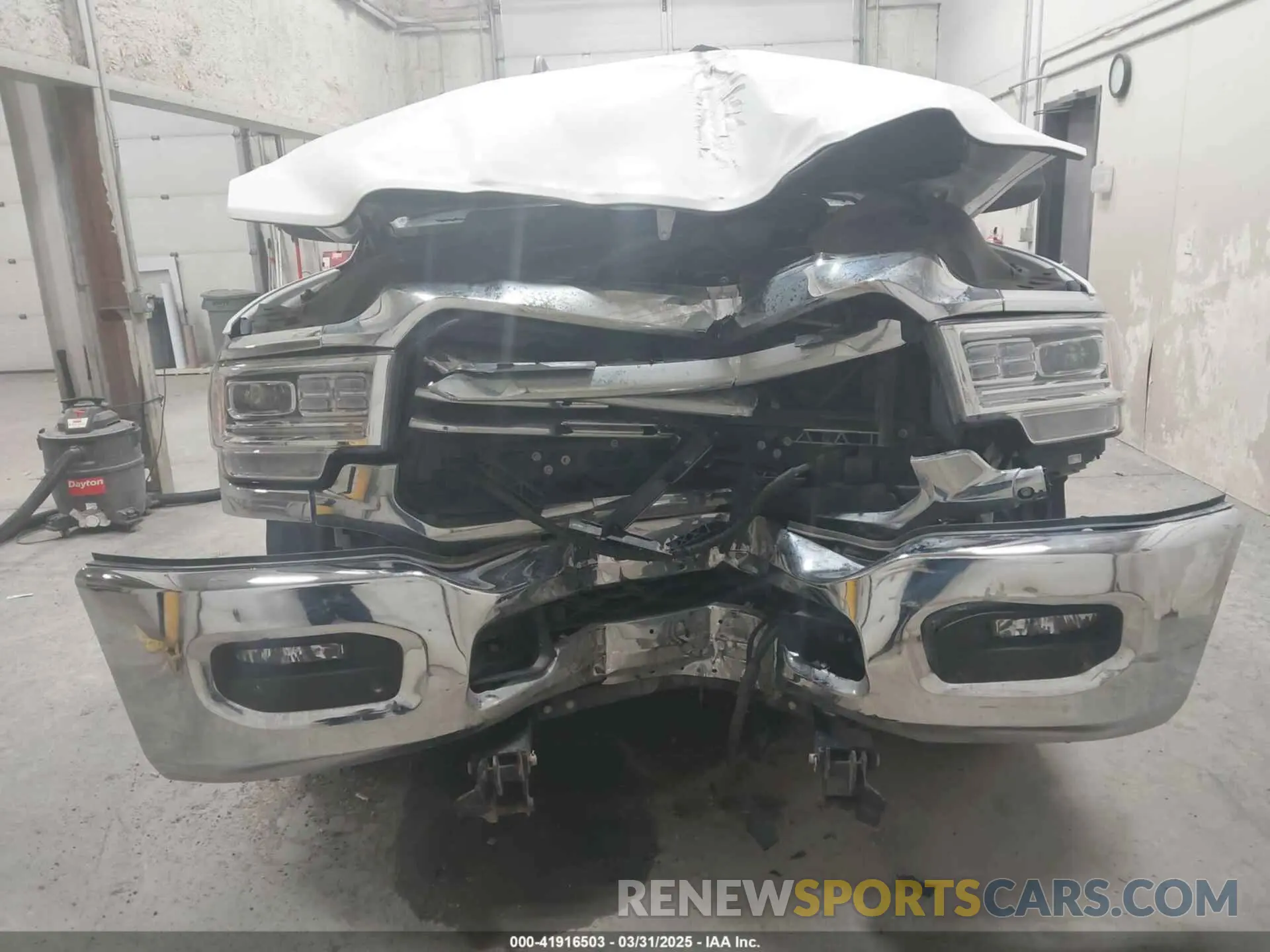 13 Photograph of a damaged car 3C6UR5PJ2NG183642 RAM 2500 2022
