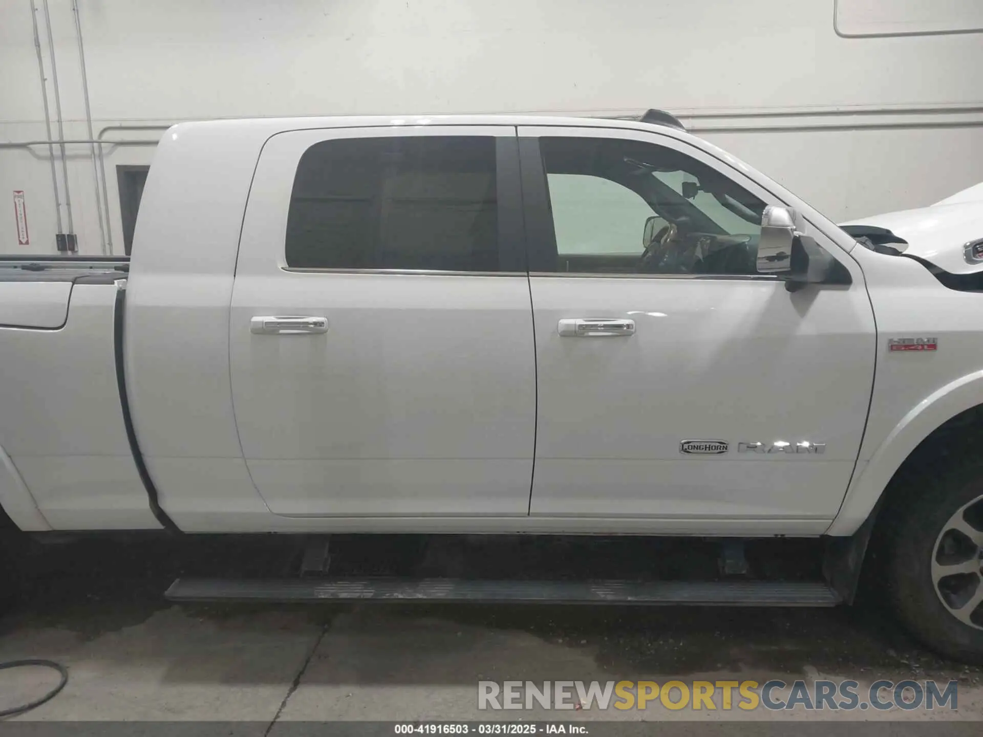 14 Photograph of a damaged car 3C6UR5PJ2NG183642 RAM 2500 2022
