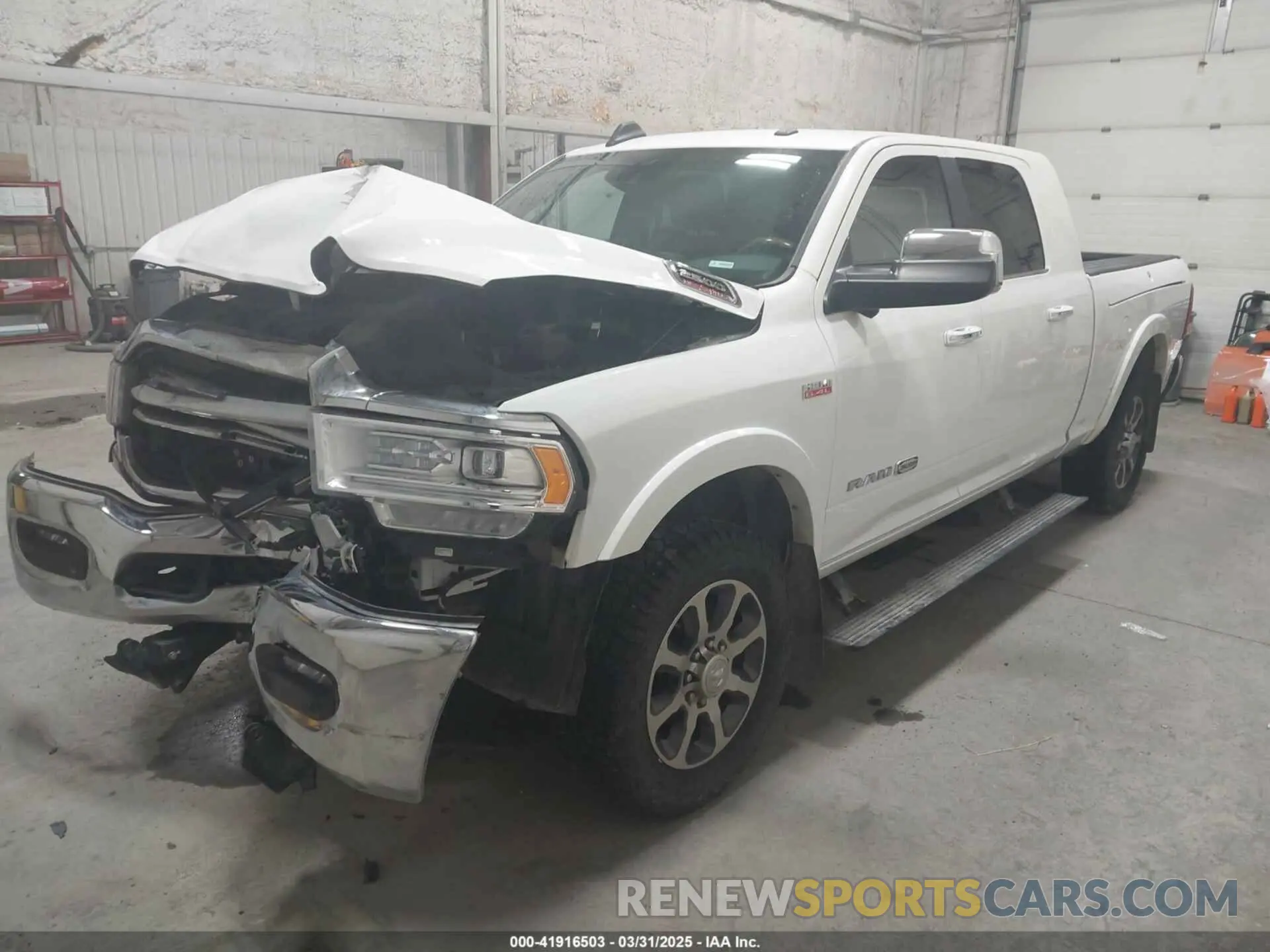 2 Photograph of a damaged car 3C6UR5PJ2NG183642 RAM 2500 2022
