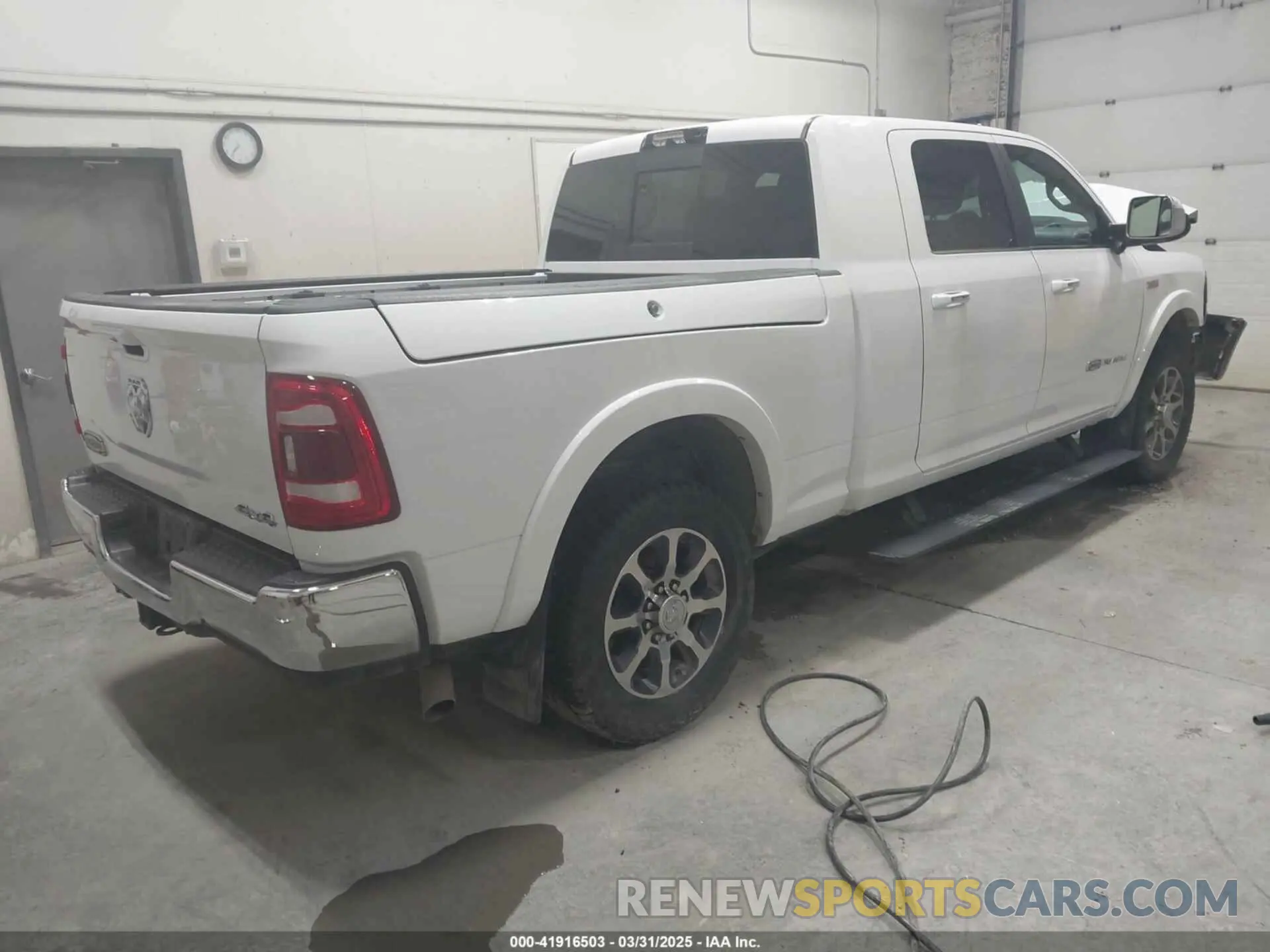 4 Photograph of a damaged car 3C6UR5PJ2NG183642 RAM 2500 2022