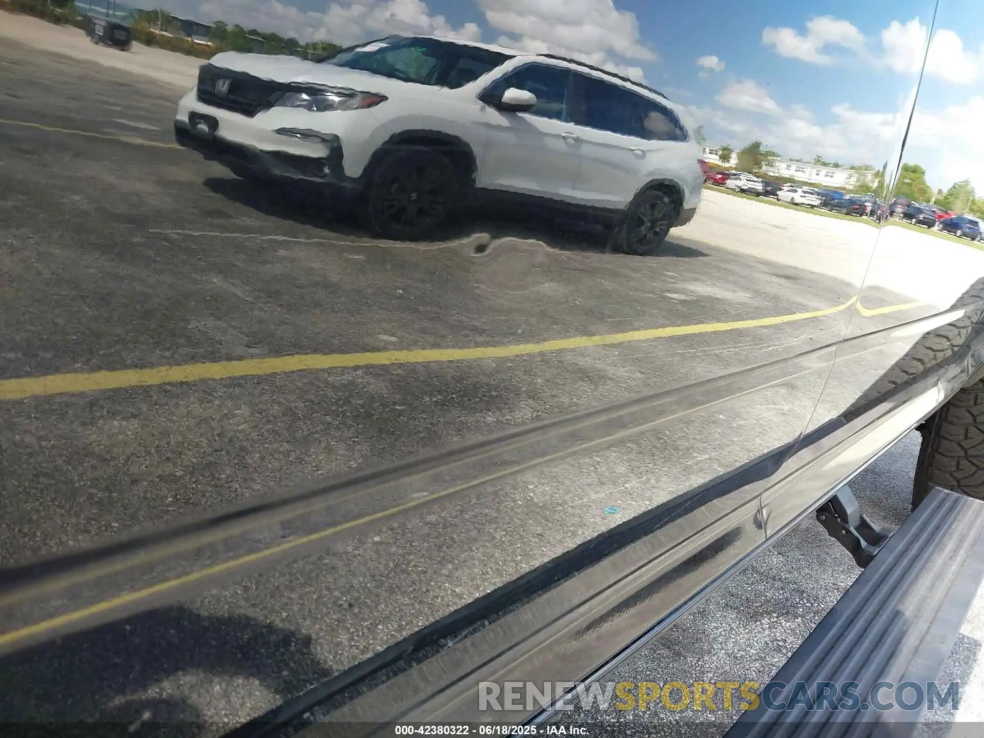 19 Photograph of a damaged car 3C6UR5PL8NG158407 RAM 2500 2022