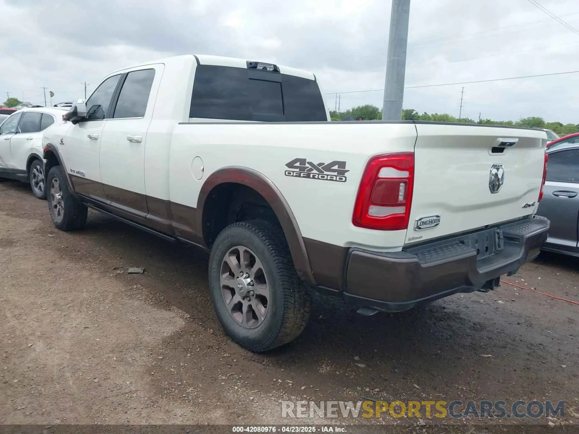 3 Photograph of a damaged car 3C6UR5PL9NG261593 RAM 2500 2022