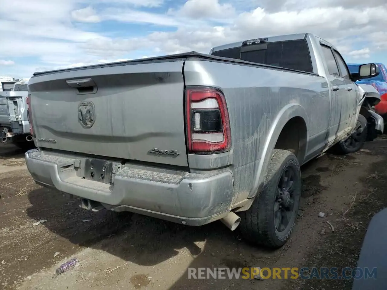 3 Photograph of a damaged car 3C6UR5RLXNG178834 RAM 2500 2022