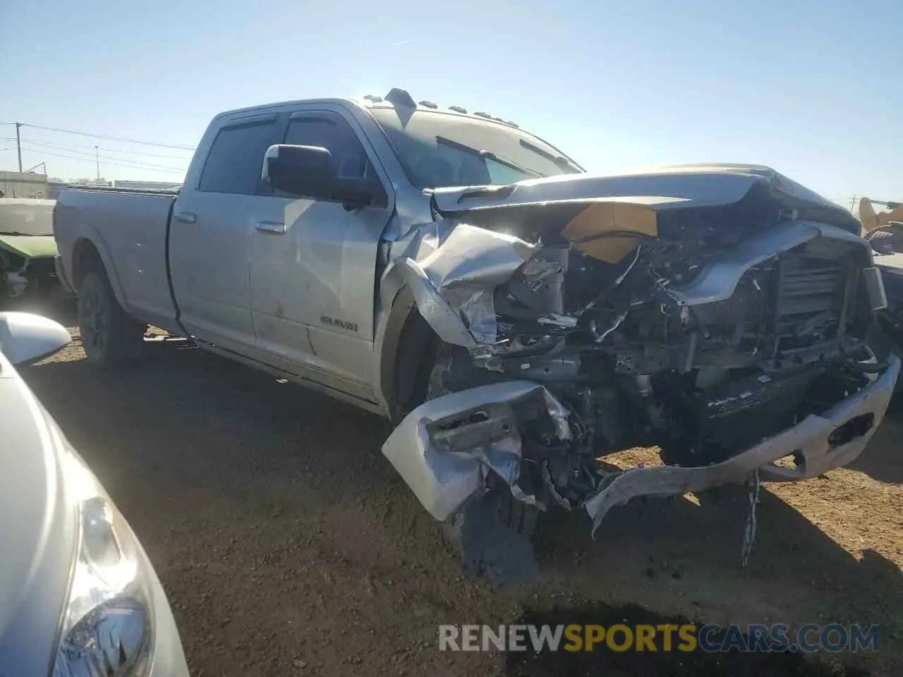 4 Photograph of a damaged car 3C6UR5RLXNG178834 RAM 2500 2022
