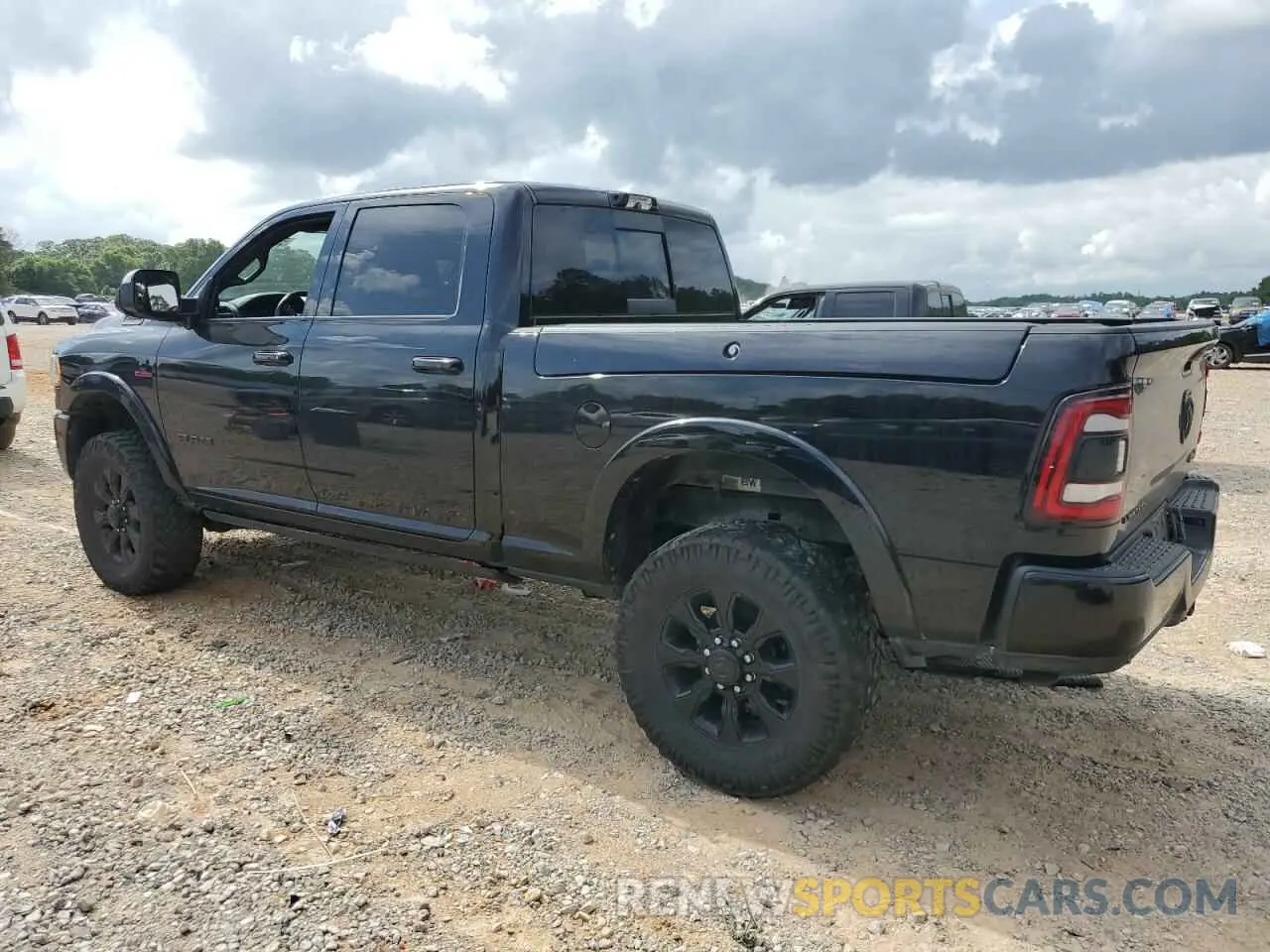 2 Photograph of a damaged car 3C6UR5SL5NG185989 RAM 2500 2022