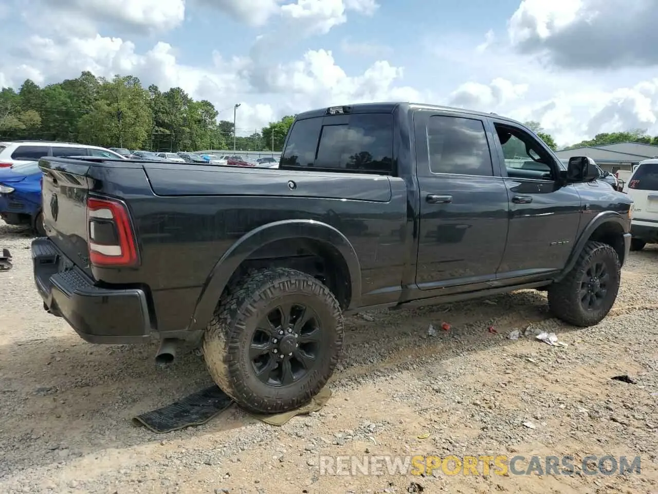 3 Photograph of a damaged car 3C6UR5SL5NG185989 RAM 2500 2022
