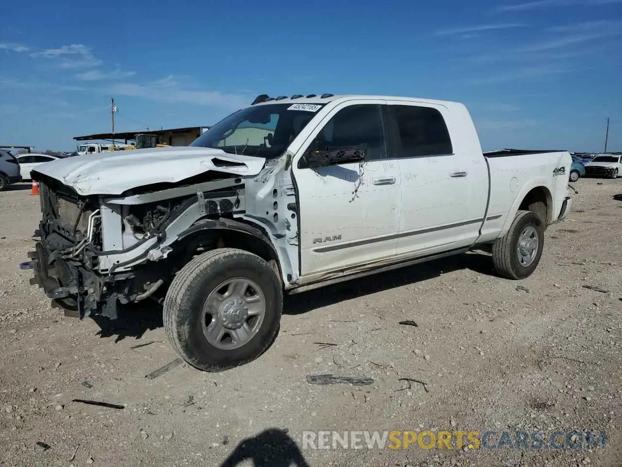1 Photograph of a damaged car 3C6UR5TL1NG391969 RAM 2500 2022