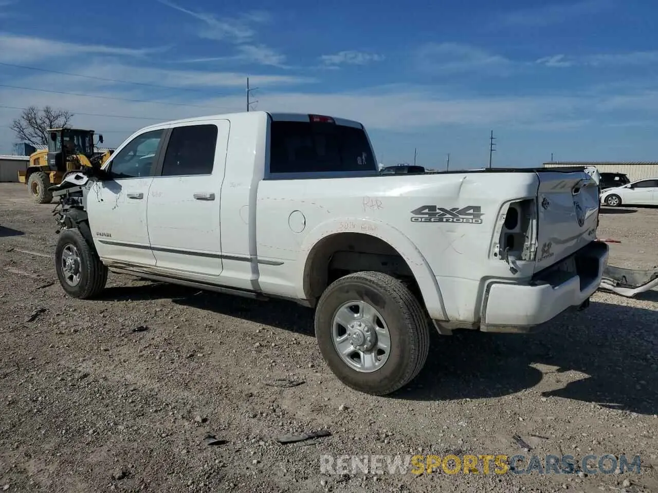 2 Photograph of a damaged car 3C6UR5TL1NG391969 RAM 2500 2022