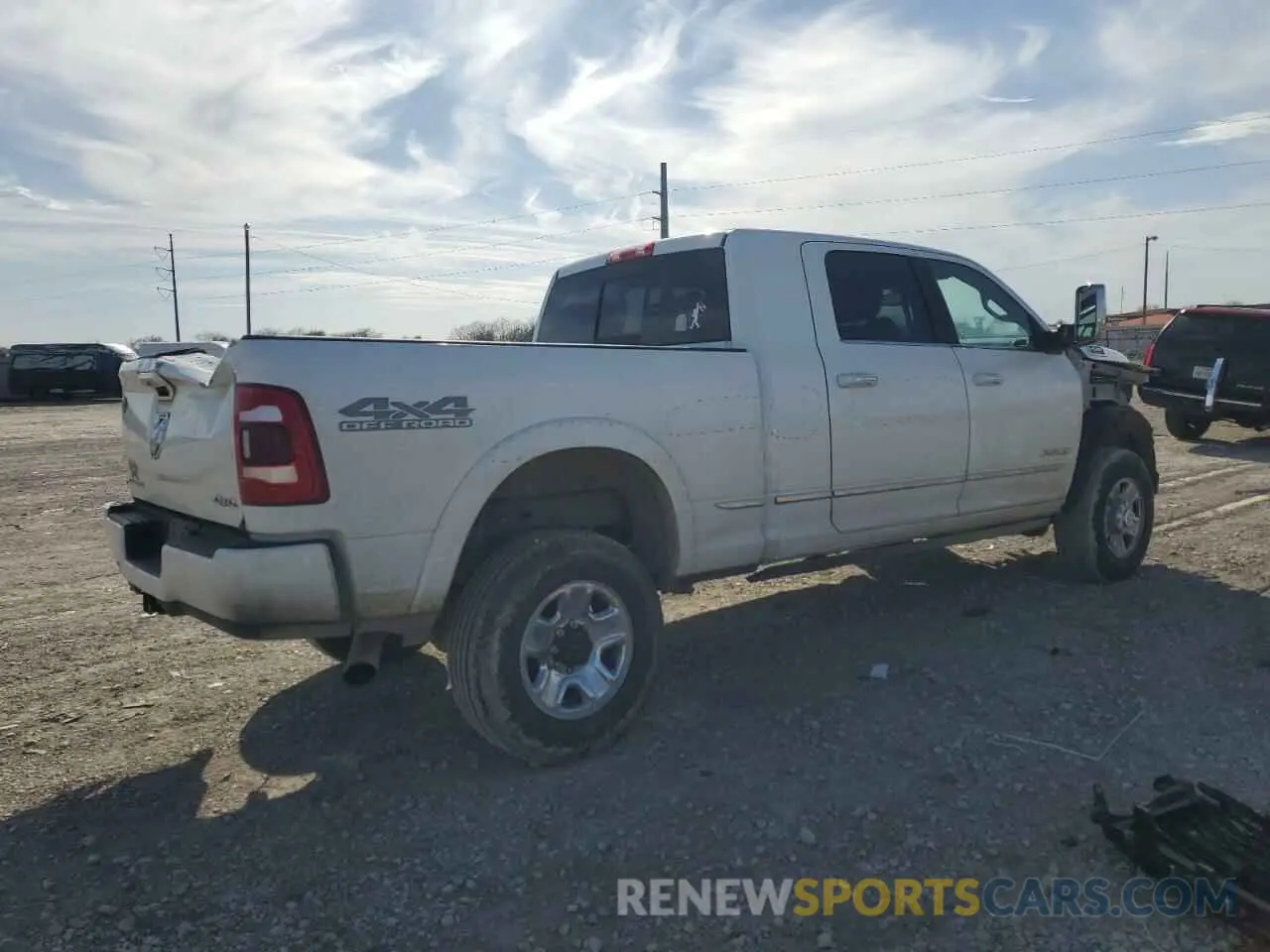 3 Photograph of a damaged car 3C6UR5TL1NG391969 RAM 2500 2022