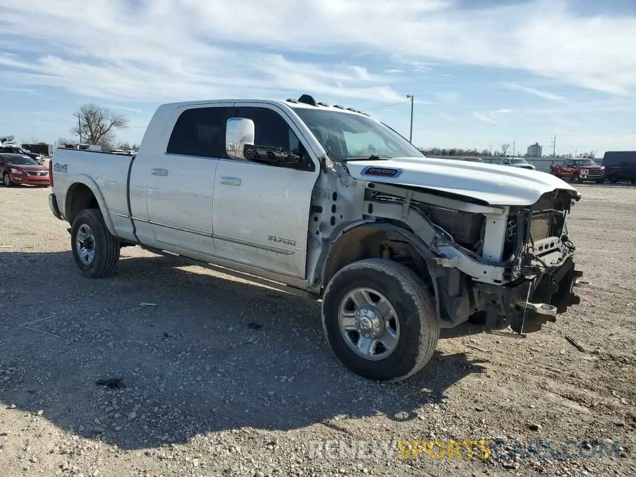 4 Photograph of a damaged car 3C6UR5TL1NG391969 RAM 2500 2022