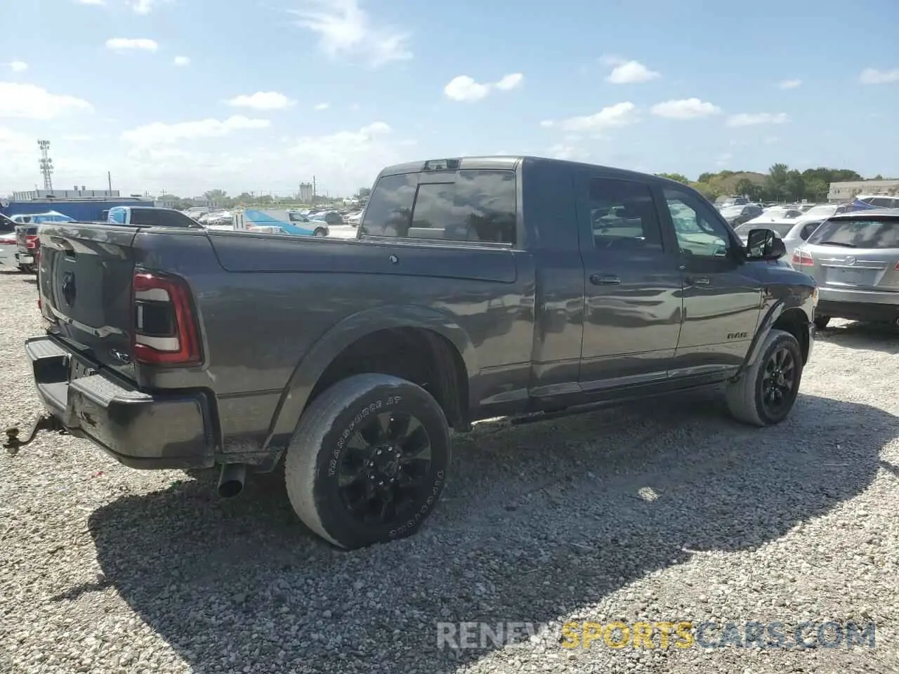 3 Photograph of a damaged car 3C6UR5TLXNG314615 RAM 2500 2022