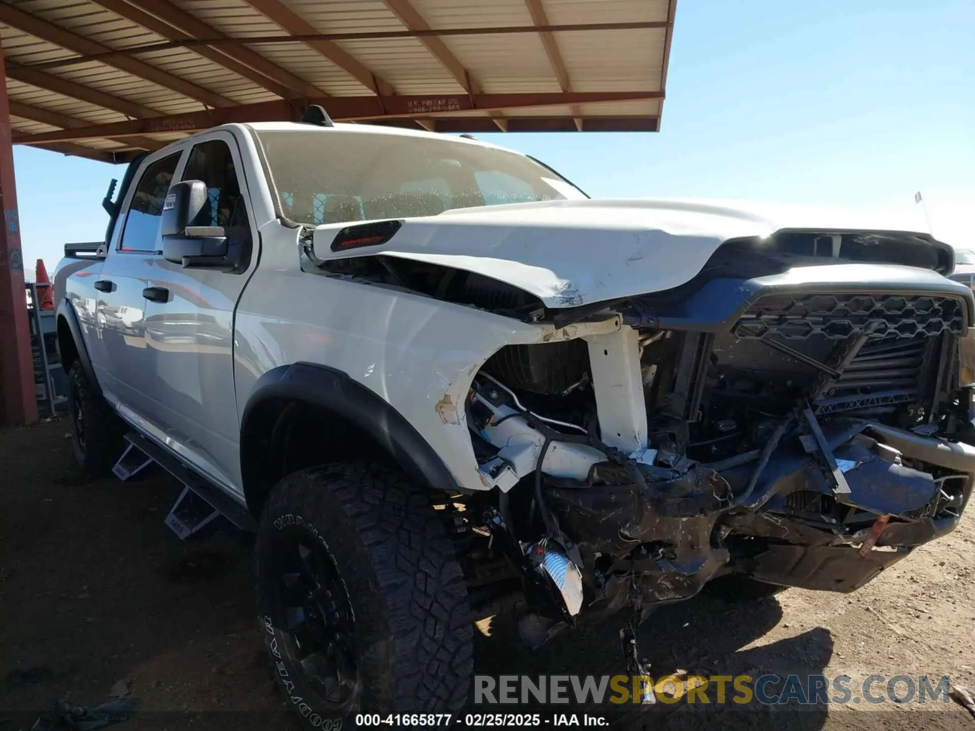 1 Photograph of a damaged car 3C6TR5CJ0PG518837 RAM 2500 2023