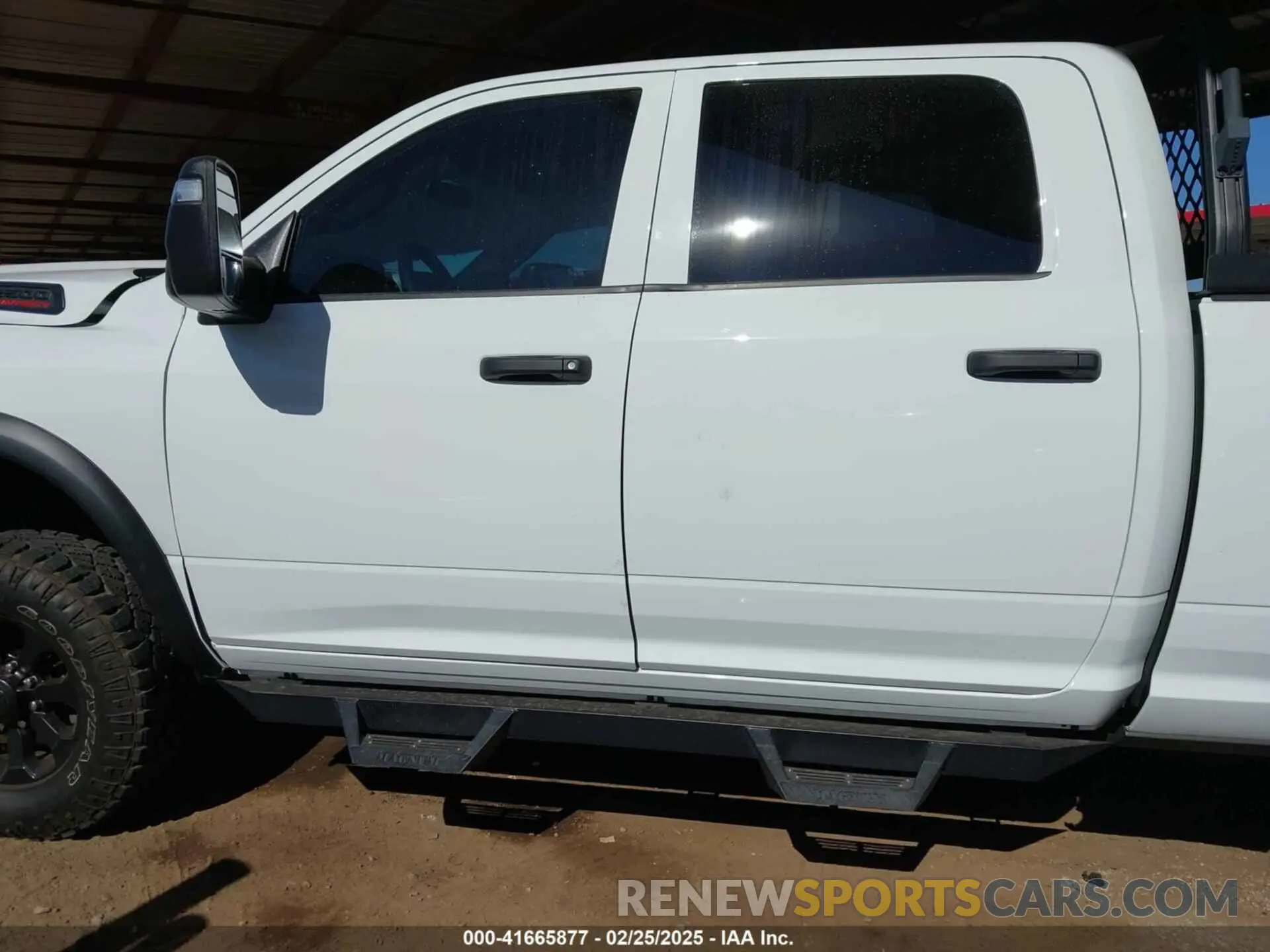 14 Photograph of a damaged car 3C6TR5CJ0PG518837 RAM 2500 2023