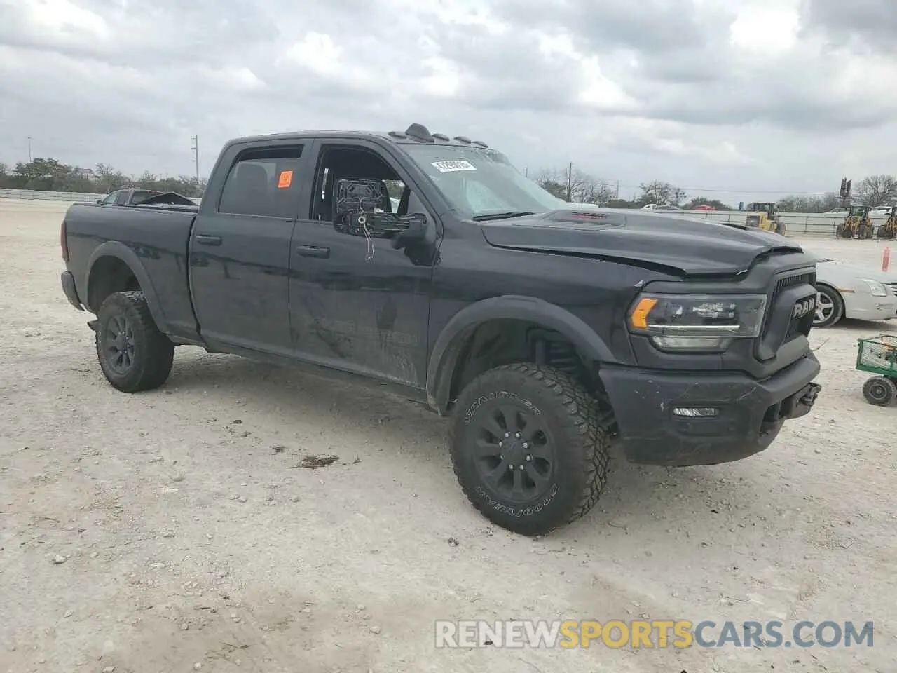 4 Photograph of a damaged car 3C6TR5EJ9PG593436 RAM 2500 2023